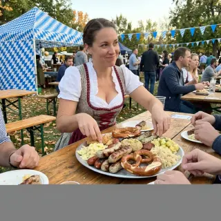 Feast for eight. Host or order the mega-platter: multiple sausages, pretzels, kraut, and sides covering the entire table.