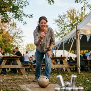 Lawn bowling: keg style. Improvised bowling using a ball or rolling jug against upright cans or bottles. Strike or bust.
