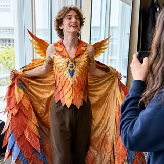 The Second Costume. Dramatically remove a cloak or mask to reveal a smaller version of the same costume underneath.
