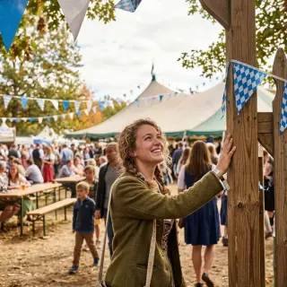 Grand fest pilgrimage. Attend an authentic Oktoberfest, German cultural festival, or full Bavarian hall. Capture the festival gates.
