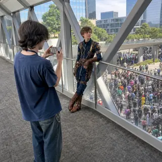 Skybridge Shot. Shoot on a host-hotel skybridge with the crowd below.